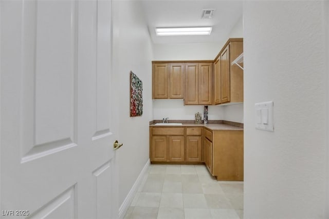1805 Prichard Ave, Henderson, NV 89052 - interior space featuring a sink, visible vents, and baseboards