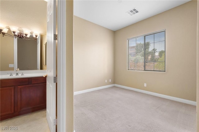 1111 Casa Palermo Cir, Henderson, NV 89011 - bathroom featuring a chandelier, baseboards, and visible vents