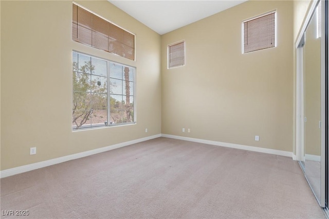 1111 Casa Palermo Cir, Henderson, NV 89011 - empty room featuring visible vents, baseboards, and light carpet