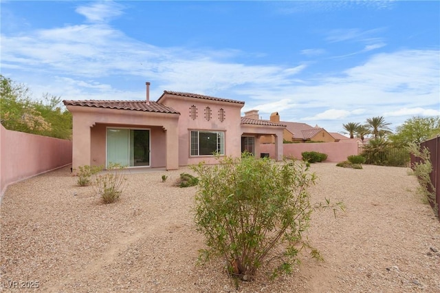 1111 Casa Palermo Cir, Henderson, NV 89011 - rear view of property with a fenced backyard, a tile roof, and stucco siding