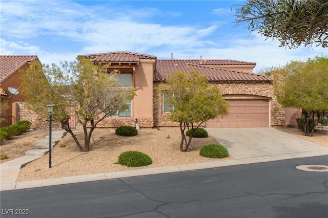 1111 Casa Palermo Cir, Henderson, NV 89011 - view of front of house with stucco siding, stone siding, a tile roof, an attached garage, and driveway