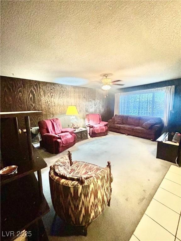 7200 Alta Dr, Las Vegas, NV 89145 - living room with a textured ceiling, carpet flooring, and a ceiling fan