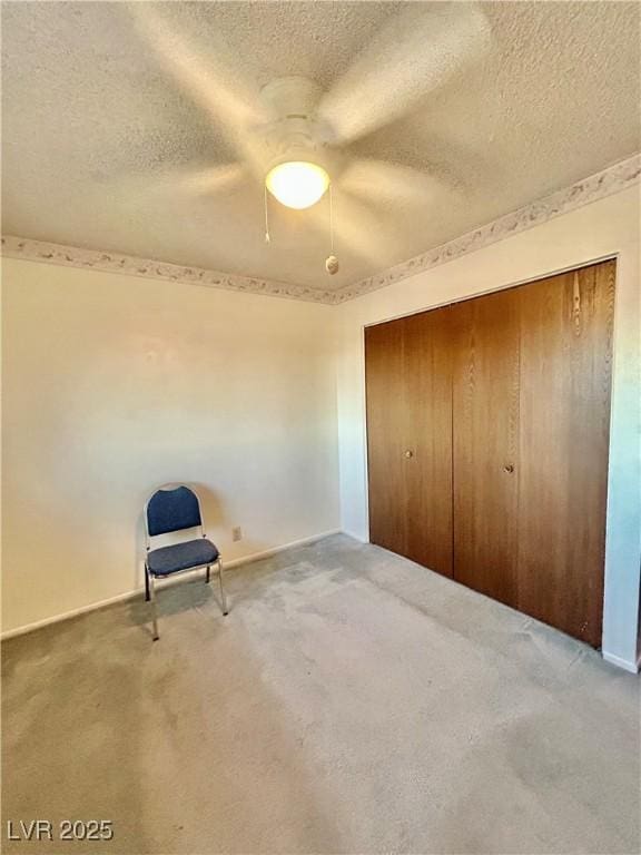 7200 Alta Dr, Las Vegas, NV 89145 - unfurnished bedroom with a closet, carpet, a textured ceiling, and a ceiling fan