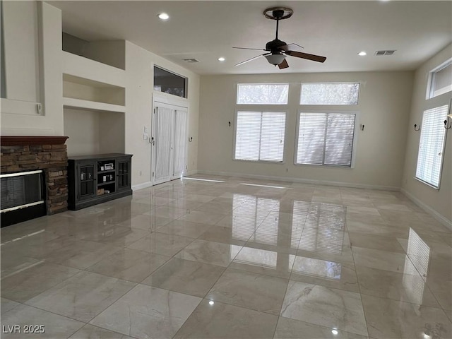 5554 Chicory Falls Ct, Las Vegas, NV 89148 - unfurnished living room with visible vents, baseboards, a ceiling fan, and marble finish floor