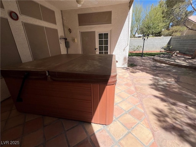 5554 Chicory Falls Ct, Las Vegas, NV 89148 - view of patio / terrace with fence and a hot tub