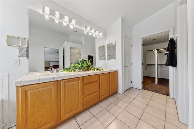 3024 Pismo Beach Dr, Las Vegas, NV 89128 - bathroom featuring tile patterned floors and double vanity