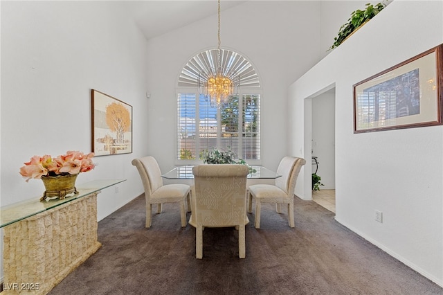 3024 Pismo Beach Dr, Las Vegas, NV 89128 - dining room with a chandelier, dark colored carpet, and high vaulted ceiling