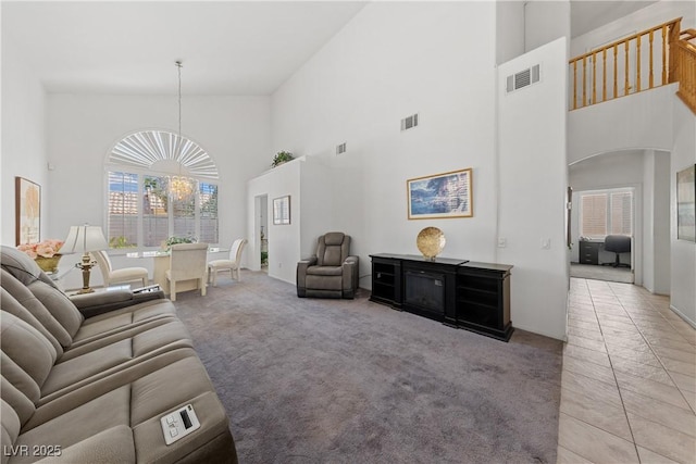 3024 Pismo Beach Dr, Las Vegas, NV 89128 - living area featuring a towering ceiling and carpet floors