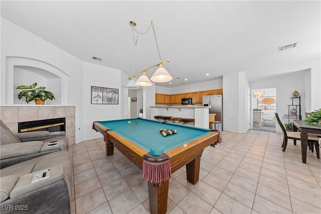 3024 Pismo Beach Dr, Las Vegas, NV 89128 - game room with billiards table, a fireplace, light tile patterned flooring, and recessed lighting
