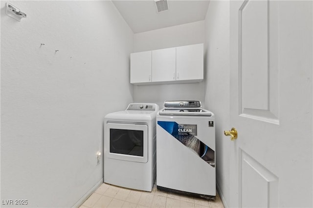 3024 Pismo Beach Dr, Las Vegas, NV 89128 - washroom featuring washing machine and clothes dryer, cabinet space, and baseboards