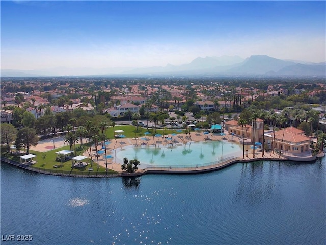 3024 Pismo Beach Dr, Las Vegas, NV 89128 - aerial perspective of suburban area featuring mountains and a pool area