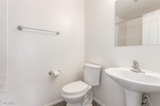 9339 Bondeno St, Las Vegas, NV 89123 - full bathroom with baseboards, a sink, and toilet