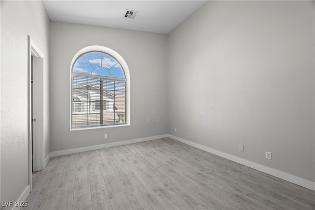 10342 Cherry Brook St, Las Vegas, NV 89183 - spare room featuring visible vents, light wood finished floors, and baseboards