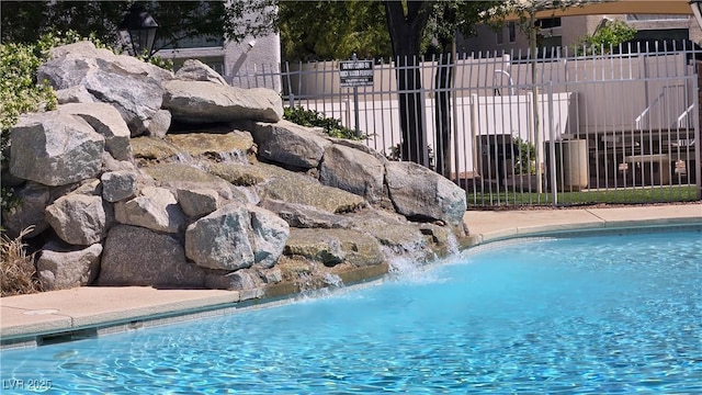 10342 Cherry Brook St, Las Vegas, NV 89183 - view of swimming pool featuring fence