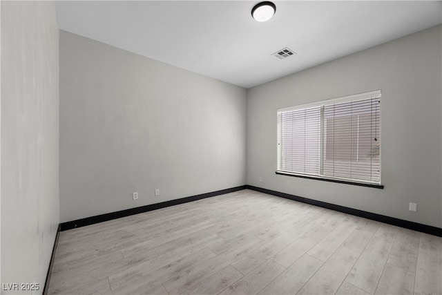 10342 Cherry Brook St, Las Vegas, NV 89183 - empty room featuring baseboards, visible vents, and wood finished floors