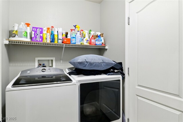 washroom featuring washing machine and dryer