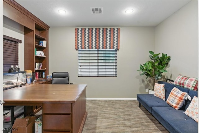 carpeted office with baseboards, recessed lighting, and visible vents
