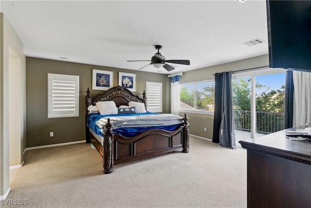 bedroom featuring baseboards, light colored carpet, access to exterior, and visible vents