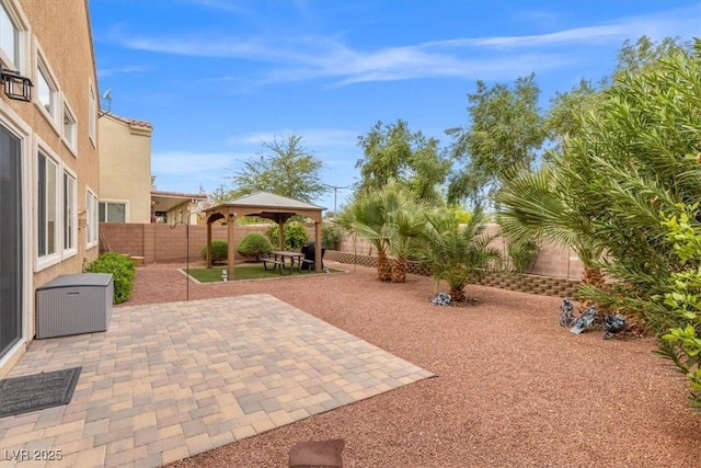 4212 Hawks Glide Ave, North Las Vegas, NV 89084 - fenced backyard with a gazebo and a patio