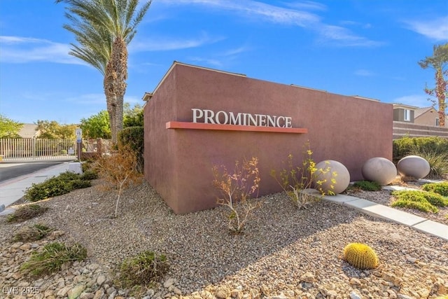 community sign featuring fence