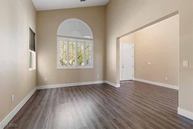 4212 Hawks Glide Ave, North Las Vegas, NV 89084 - unfurnished room featuring wood finished floors and a towering ceiling