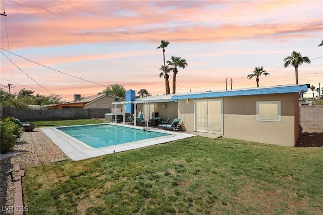 view of swimming pool with a fenced backyard, a fenced in pool, a patio, and a lawn