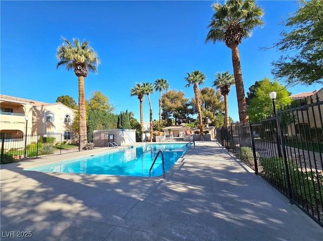 8452 Boseck Dr Unit 216, Las Vegas, NV 89145 - community pool featuring a patio