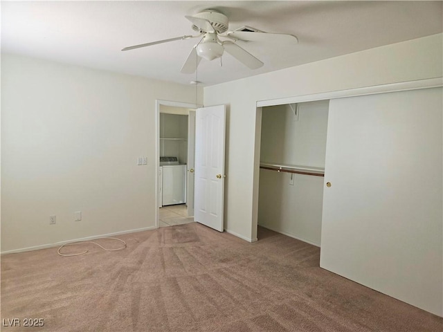 8452 Boseck Dr Unit 216, Las Vegas, NV 89145 - unfurnished bedroom with washer / dryer, carpet flooring, a closet, ceiling fan, and baseboards