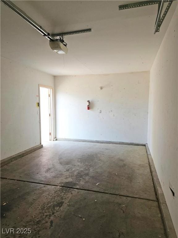 8452 Boseck Dr Unit 216, Las Vegas, NV 89145 - garage featuring a garage door opener