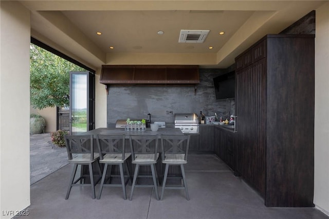1123 Christian Rd, Henderson, NV 89002 - view of patio featuring grilling area and outdoor dining space