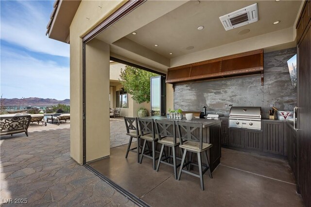 1123 Christian Rd, Henderson, NV 89002 - view of patio / terrace featuring a mountain view and a bar