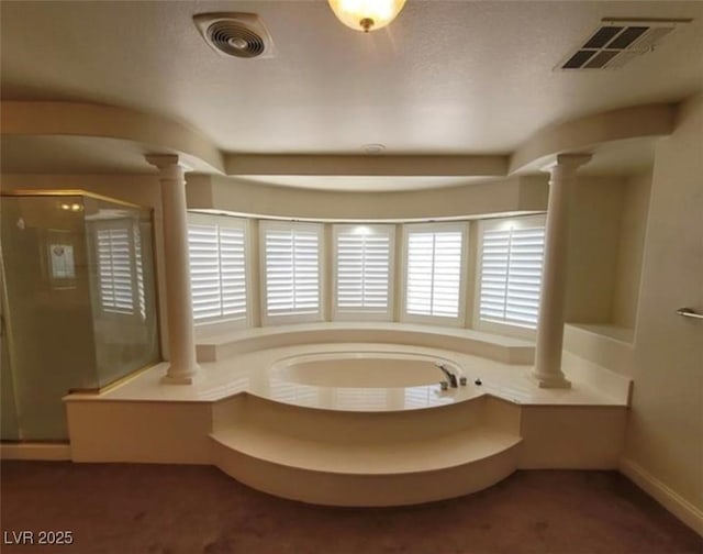 full bath with visible vents, ornate columns, a stall shower, and a garden tub