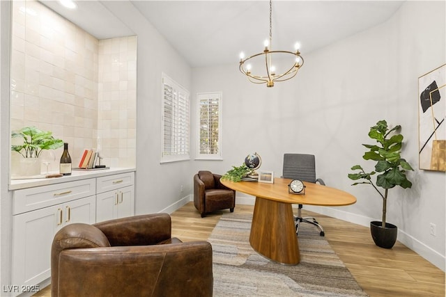 800 Jody Brook Ct, Las Vegas, NV 89145 - office space with a chandelier, baseboards, and light wood finished floors