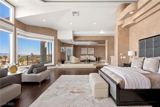 5020 Spanish Heights Dr, Las Vegas, NV 89148 - bedroom with hardwood / wood-style floors, multiple windows, and recessed lighting