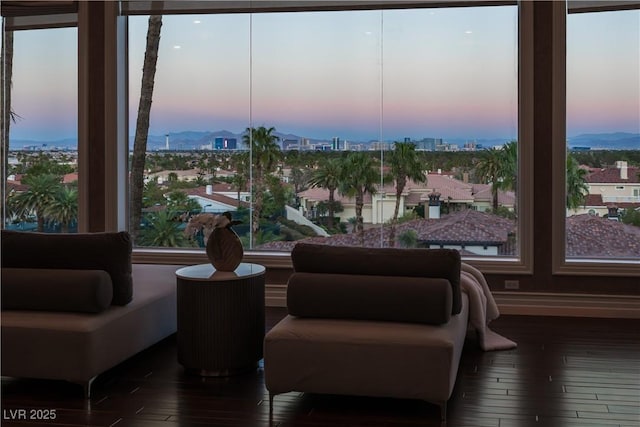 5020 Spanish Heights Dr, Las Vegas, NV 89148 - interior space with multiple windows, wood finished floors, and a mountain view