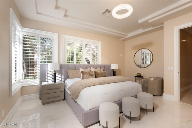 5020 Spanish Heights Dr, Las Vegas, NV 89148 - bedroom with baseboards, light tile patterned floors, and a raised ceiling