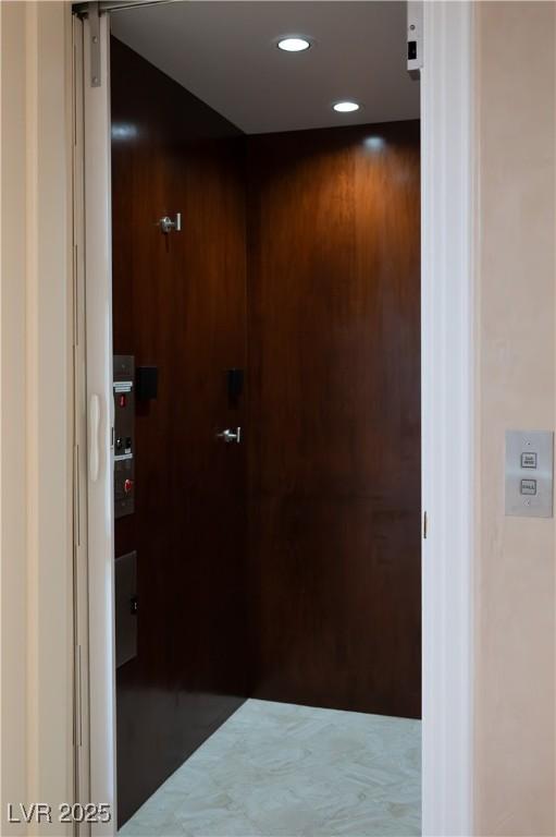 5020 Spanish Heights Dr, Las Vegas, NV 89148 - hallway featuring recessed lighting and elevator