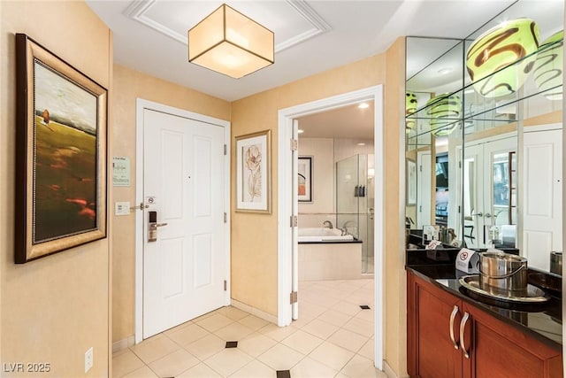 145 E Harmon Ave Unit 2019, Las Vegas, NV 89109 - foyer entrance featuring light tile patterned floors and baseboards