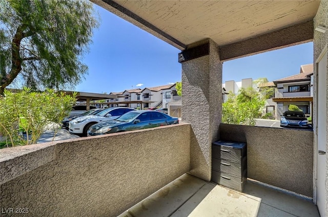 balcony featuring a residential view