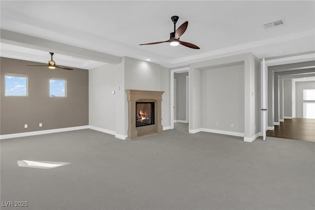 2805 Proust Ct, Henderson, NV 89044 - unfurnished living room with a ceiling fan, carpet, and a warm lit fireplace