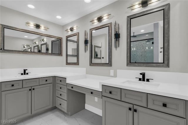 2805 Proust Ct, Henderson, NV 89044 - full bath with marble look tiles, two vanities, walk in shower, and recessed lighting