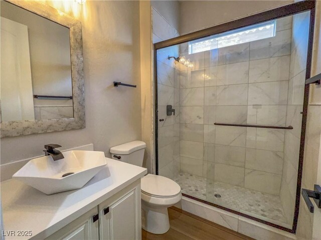 2805 Proust Ct, Henderson, NV 89044 - full bath featuring vanity, a shower stall, and wood finished floors