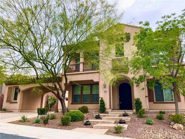 2805 Proust Ct, Henderson, NV 89044 - view of front of property with a balcony, stucco siding, and concrete driveway