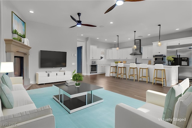 2805 Proust Ct, Henderson, NV 89044 - living area featuring ceiling fan, wood finished floors, and recessed lighting