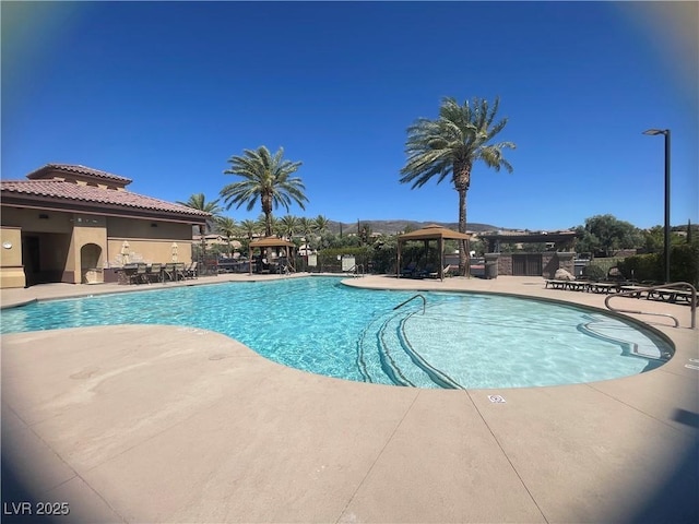 2805 Proust Ct, Henderson, NV 89044 - community pool featuring a gazebo and a patio