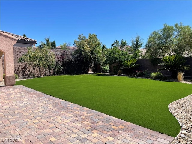 2805 Proust Ct, Henderson, NV 89044 - fenced backyard with a patio area