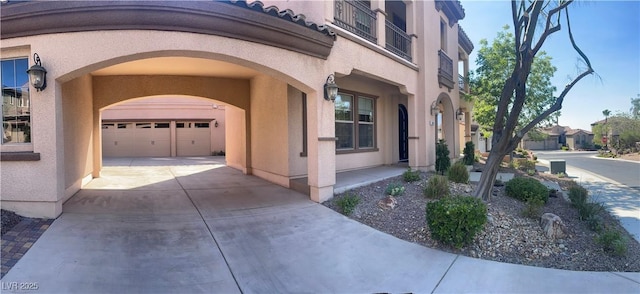 2805 Proust Ct, Henderson, NV 89044 - view of home's exterior with driveway, stucco siding, and a garage