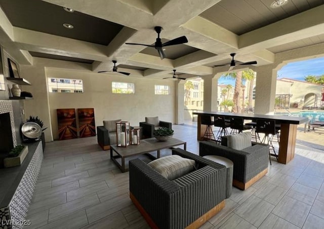 view of patio / terrace with a ceiling fan and an outdoor hangout area