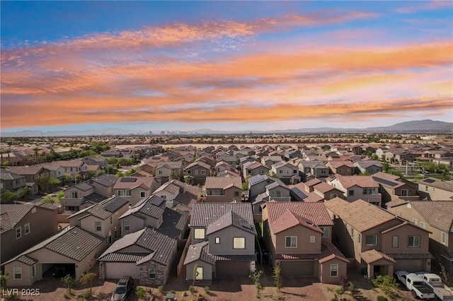 birds eye view of property featuring a residential view and a mountain view
