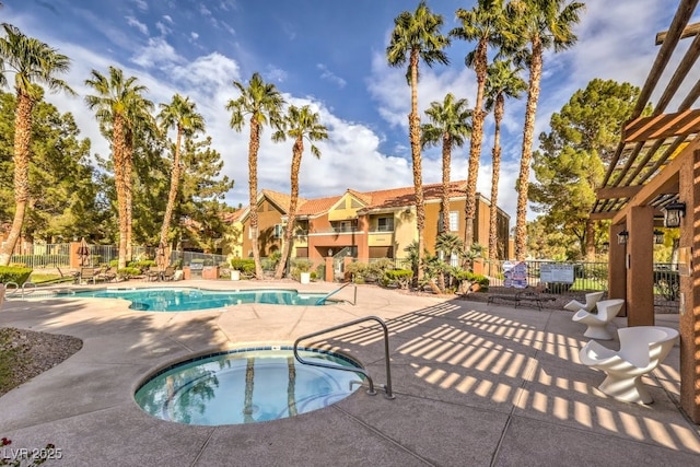 2120 Ramrod Ave Unit 2216, Henderson, NV 89014 - community pool with a patio area, fence, and a hot tub